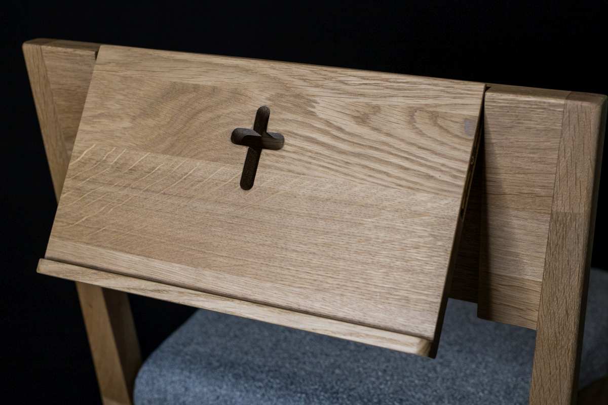 oak church pews ZOE with a counter for the Bible or songbook.